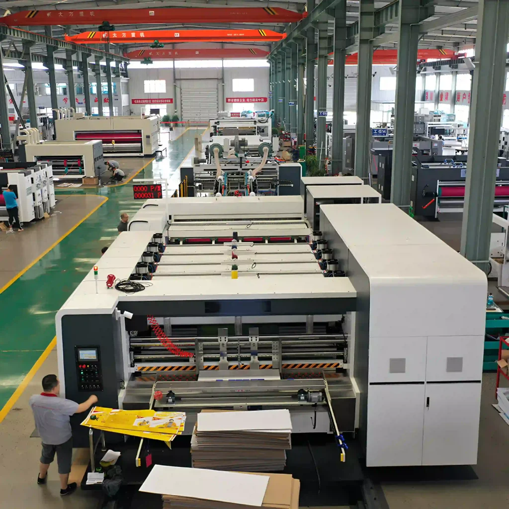 “Jeytop集成制造体系下的现代化纸箱厂一角。我们通过掌控从纸板生产到纸箱成型的全流程,确保交付给您的每一个结果都具备确定性。” modern-box-manufacturing-plant-with-integrated-corrugated-board-production