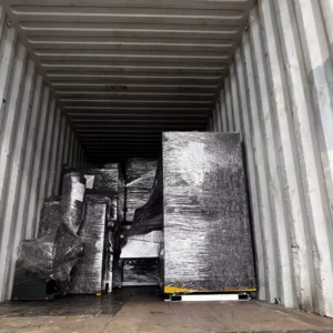 Automatic Box Stitching Machine in loading to container